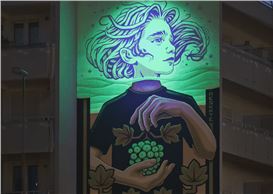 Reskate’s Youthful Murals Transform into Glowing Symbols of Peace