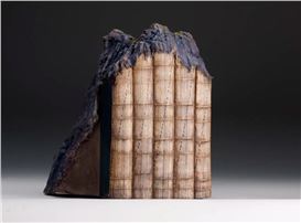 Artist Transforms Discarded Books Into Mini Mountainous Sculptures