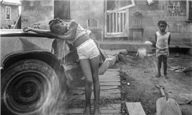 A Husband and Wife Kiss in a Doorway: Baldwin Lee’s Best Photograph