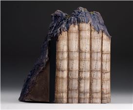 Blasting Books with High-Pressure Water, Guy Laramée Scales Mountains of Knowledge