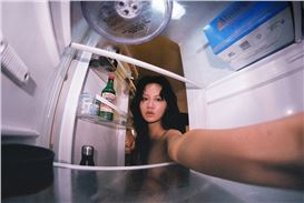 Between Worlds: John Yuyi’s Surreal Portrait of Nomadic Living