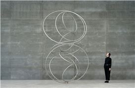 Mesmerizing Kinetic Sculpture Made of Delicately Stacked Steel Rings