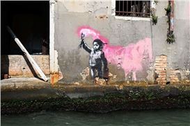 Banksy’s ‘Migrant Child’ Removed from Venice Wall for Restoration