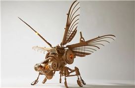 Artist Turns Cardboard Scraps Into Sci-Fi Sculptures Inspired by Past Visions of the Future