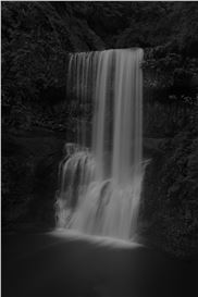 Ethereal Waterfalls Cascade Across Darkened Landscapes in Jonathan Knight’s Photos